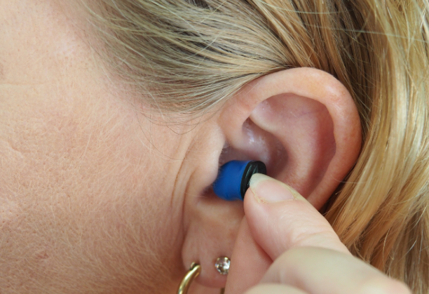 An affordable assistive device enabling audio-to-visual and haptic feedback for the hearing impaired